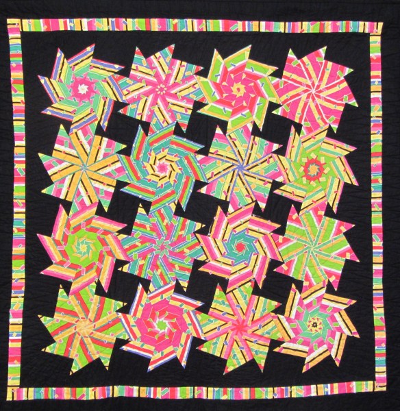 Exuberance by Wendy Starn - a windmill block cut using the stack & whack method